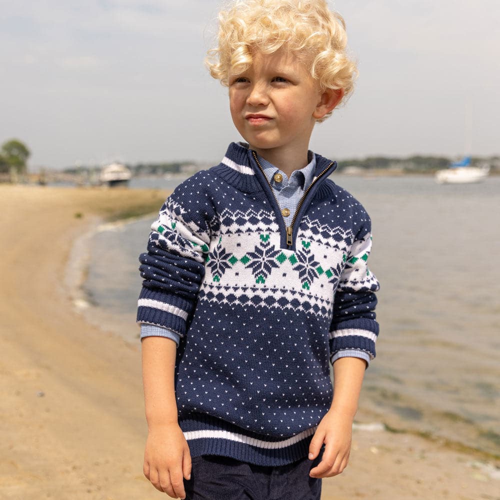 Little boy wearing boys' Alpine blue sweater with snowflake pattern, perfect for toddlers and kids this holiday season