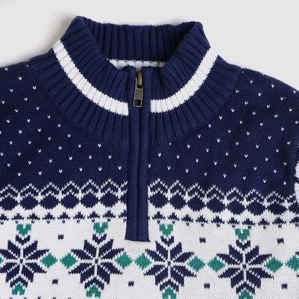 Boys' blue Alpine sweater close up view with snowflake pattern, perfect for toddlers and kids this holiday season.