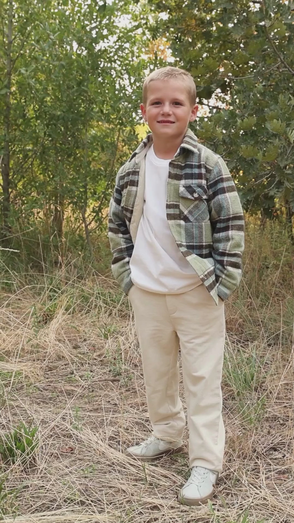 Boys standing in  Chino-Flex comfortable dress pants with details